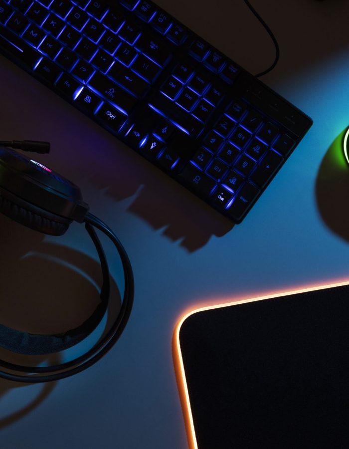 view-neon-illuminated-gaming-desk-setup-with-keyboard-1-scaled.jpg